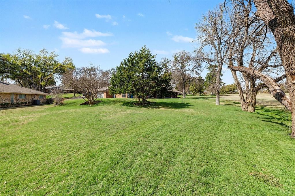 6746 Talbot Parkway Dallas, TX 75232 - Photo 32 of 34 a view of a park with large trees