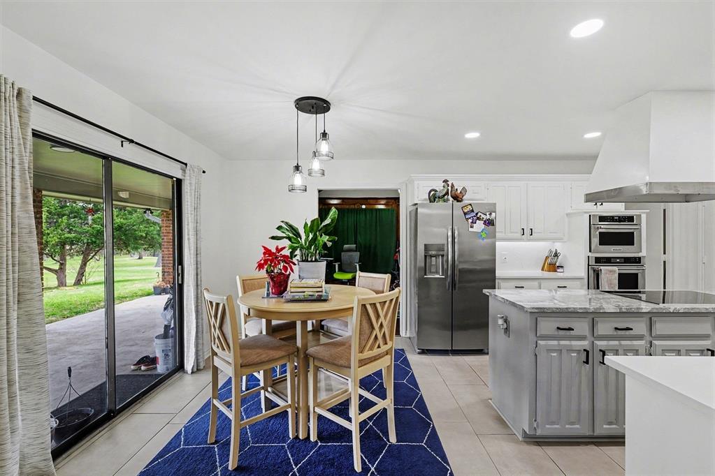 6746 Talbot Parkway Dallas, TX 75232 - Photo 10 of 34 a view of a dining room with furniture window and outside view