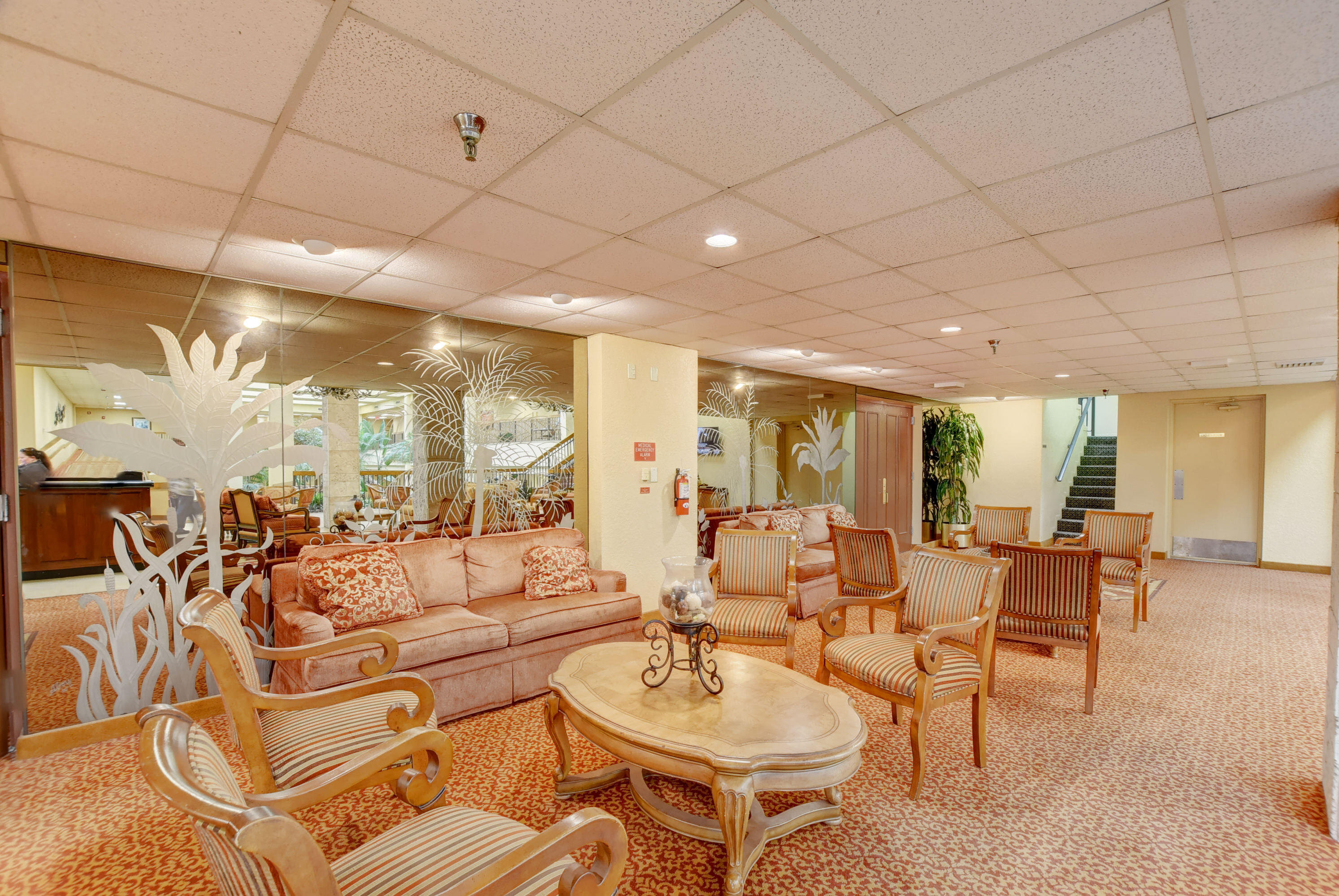 7076 Huntington Lane, Unit 507 Delray Beach, FL 33446 - Photo 31 of 48 a very nice looking dining room with a large glass table and chairs