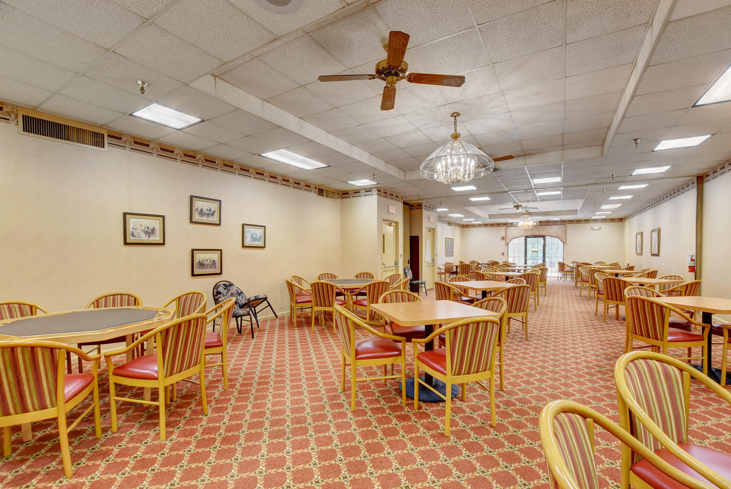 7076 Huntington Lane, Unit 507 Delray Beach, FL 33446 - Photo 40 of 48 a view of a dining room with furniture