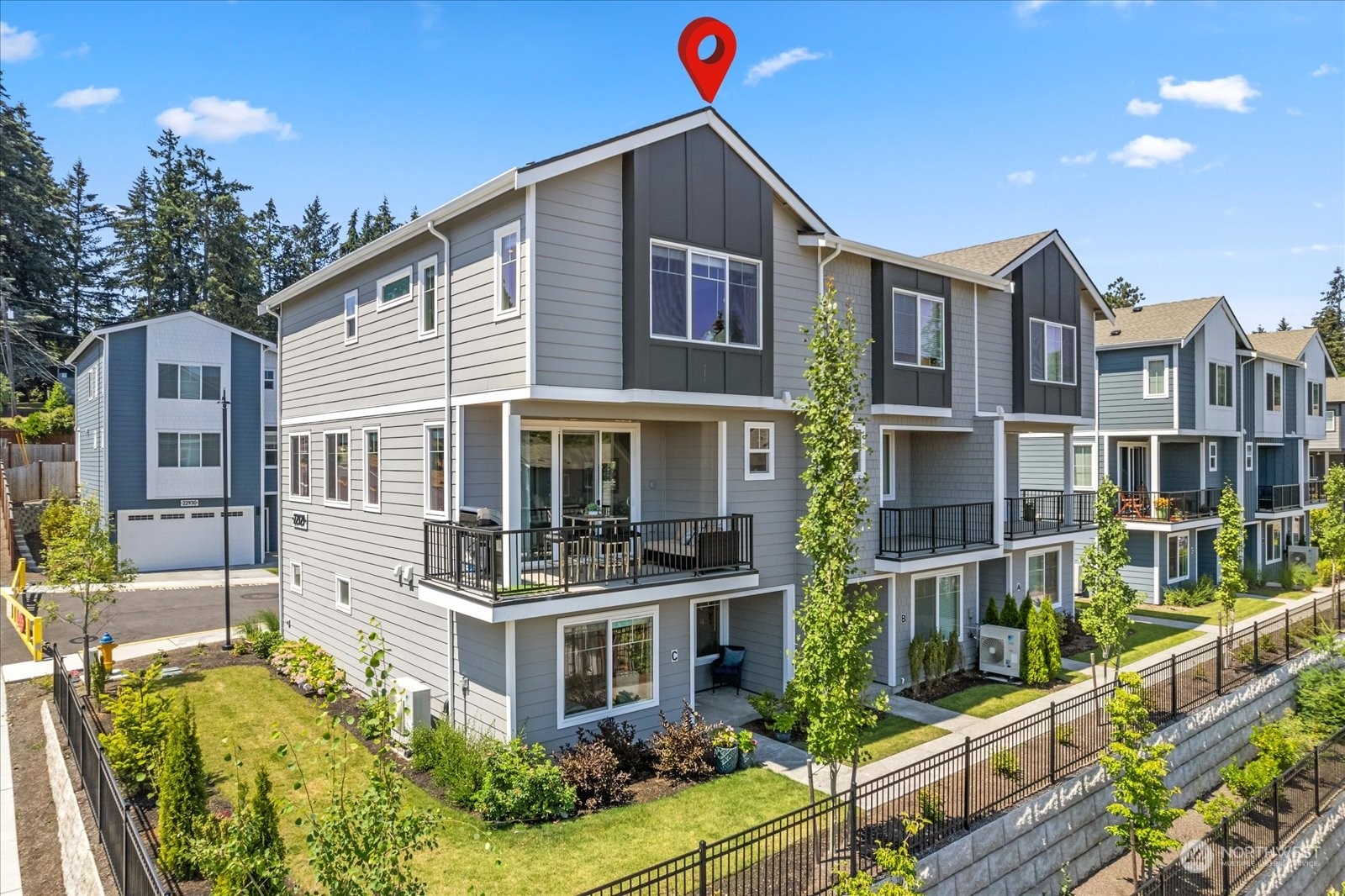 22929 80th Place West, Unit C Edmonds, WA 98026 - Photo 1 of 36 a front view of a house with street