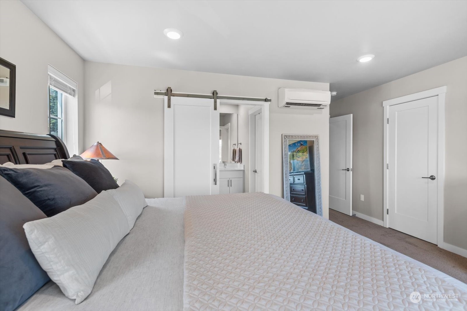 22929 80th Place West, Unit C Edmonds, WA 98026 - Photo 18 of 36 a bedroom with a bed and closet