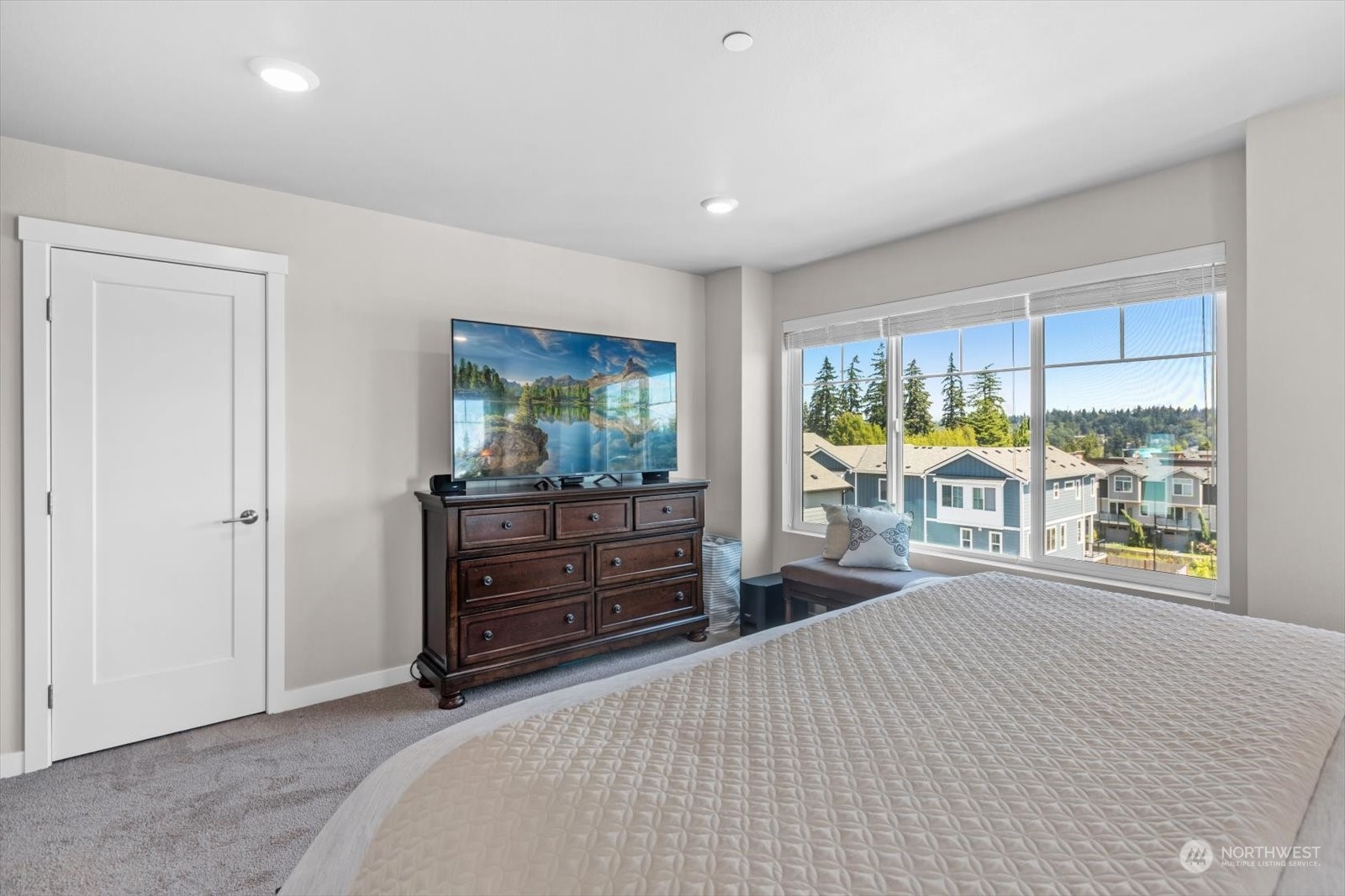 22929 80th Place West, Unit C Edmonds, WA 98026 - Photo 19 of 36 a room with a bed and a large window