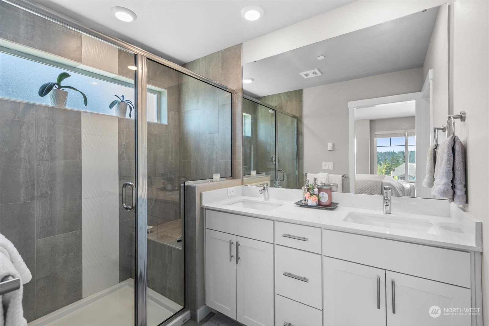 22929 80th Place West, Unit C Edmonds, WA 98026 - Photo 20 of 36 a bathroom with double sink and a mirror