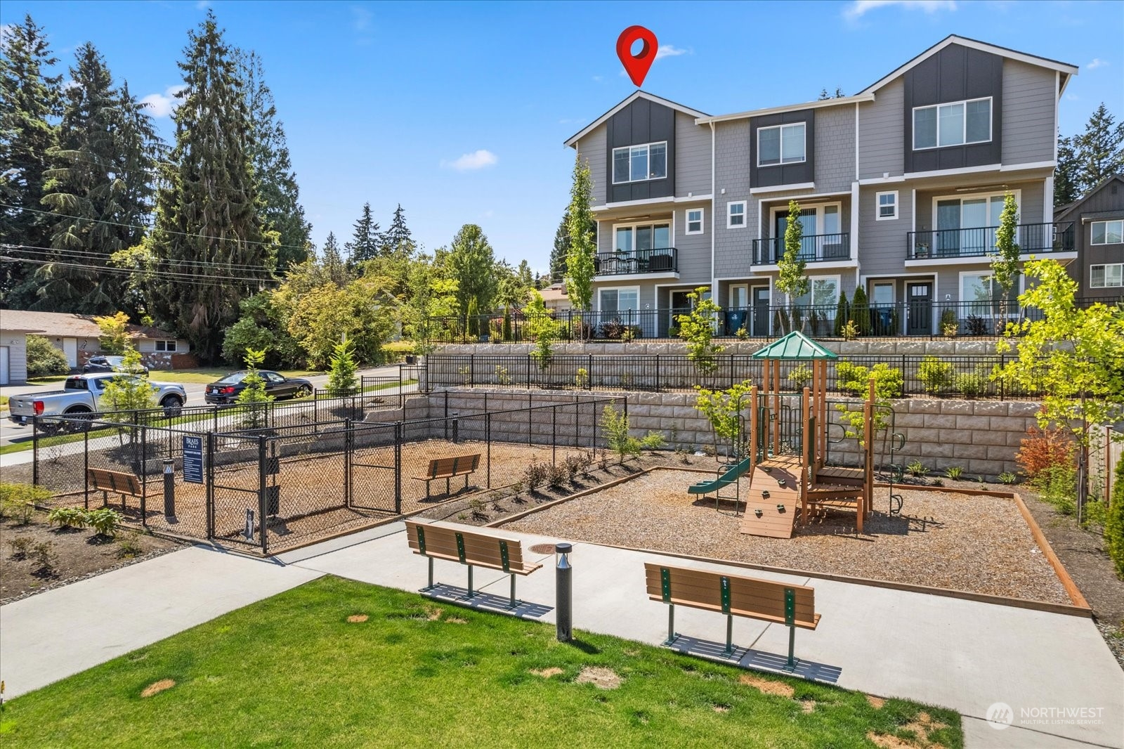 22929 80th Place West, Unit C Edmonds, WA 98026 - Photo 2 of 36 a view of a patio with table and chairs and potted plants