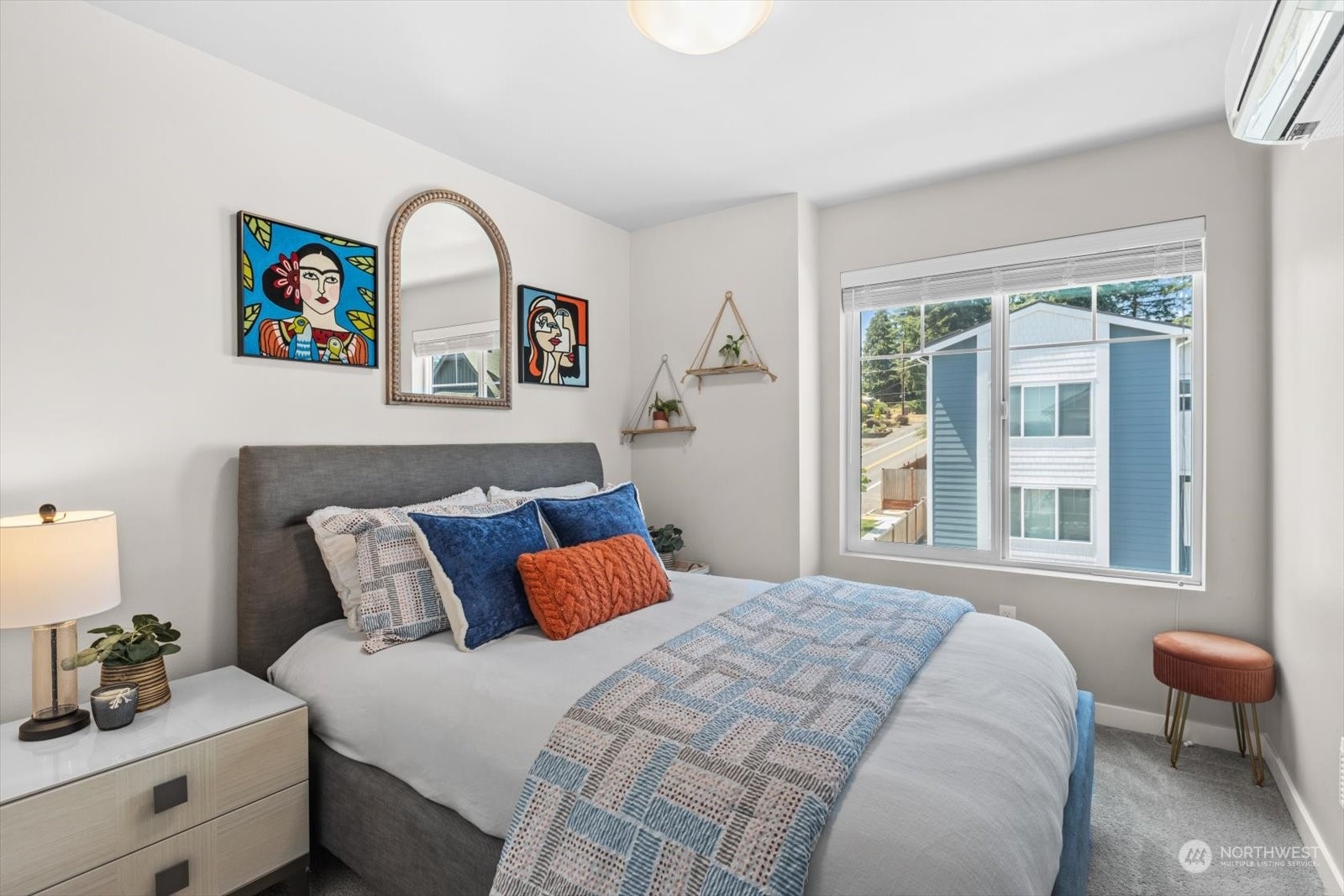 22929 80th Place West, Unit C Edmonds, WA 98026 - Photo 22 of 36 a bedroom with a bed and a window