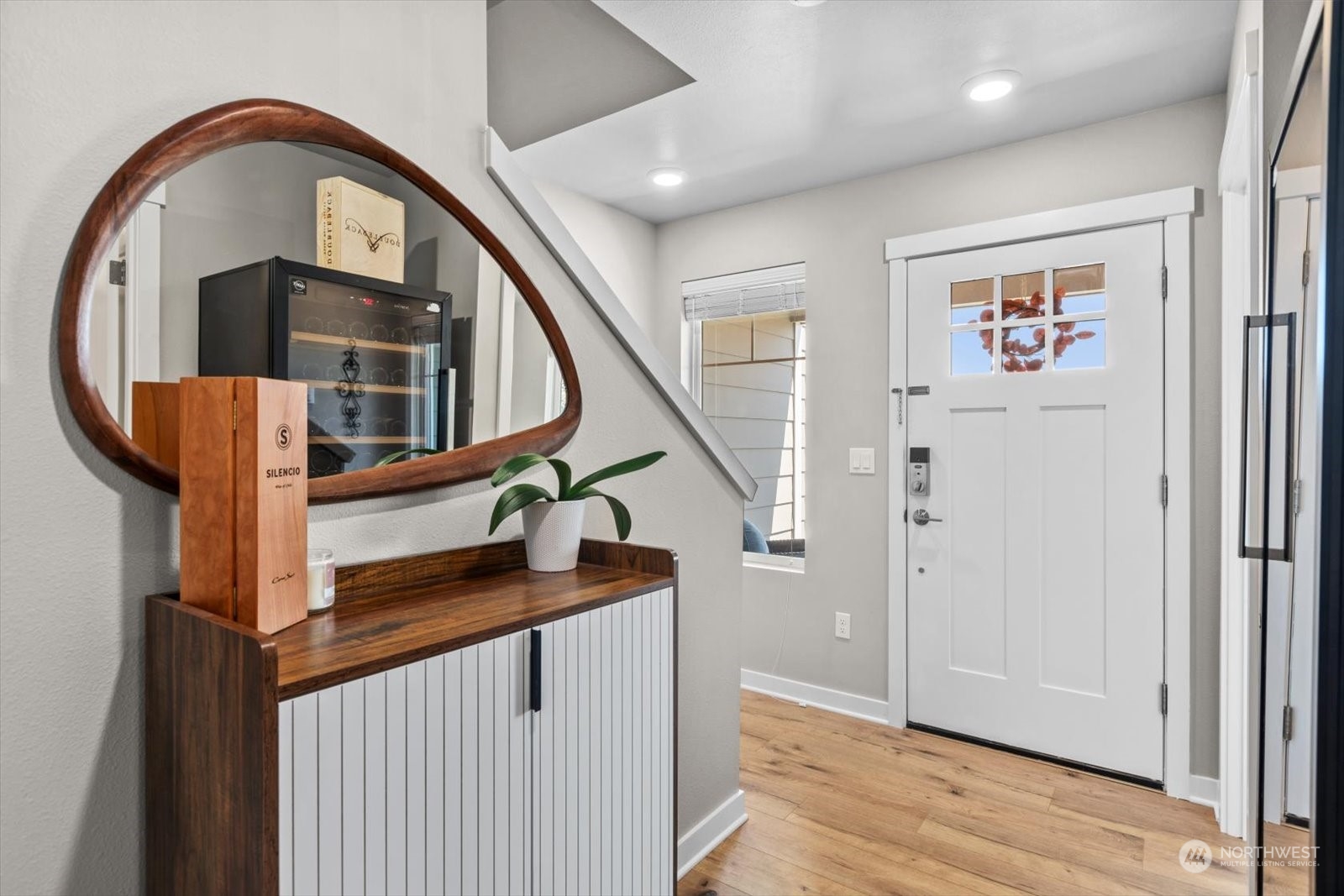 22929 80th Place West, Unit C Edmonds, WA 98026 - Photo 3 of 36 a view of entryway with wooden floor and stairs