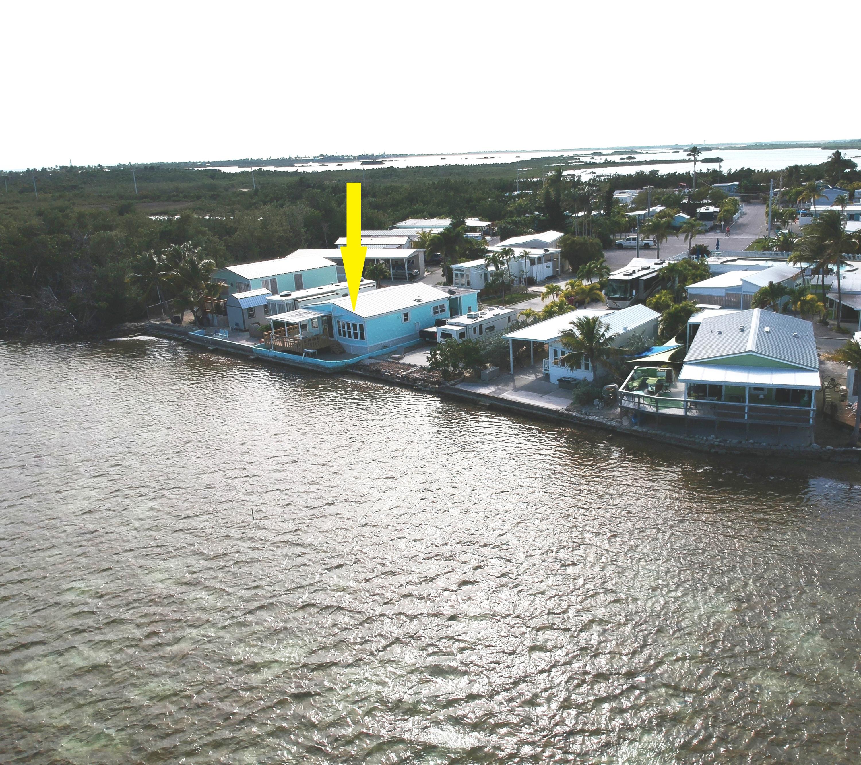 55 Boca Chica Road, Unit 430 Key West, FL 33040 - Photo 2 of 34 a view of a lake with houses