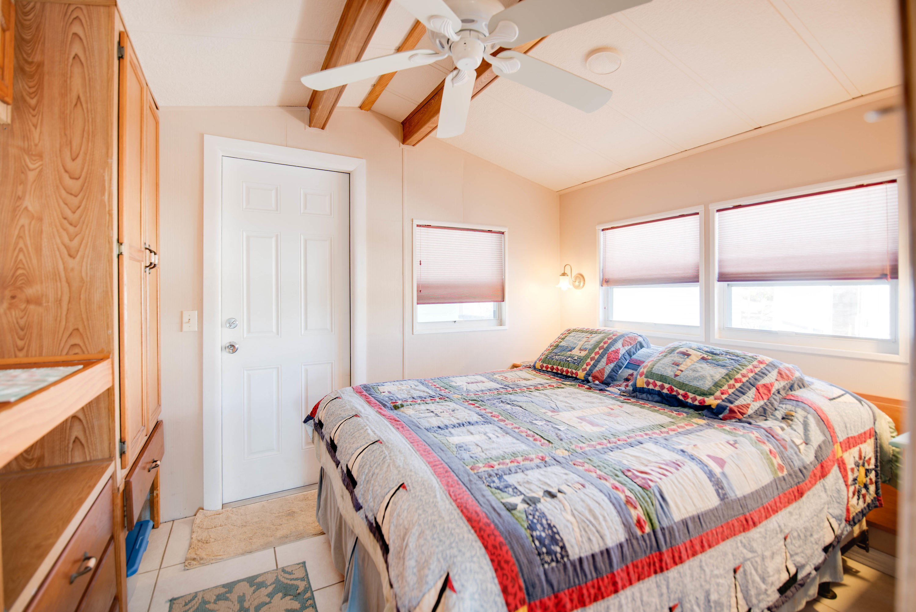 55 Boca Chica Road, Unit 430 Key West, FL 33040 - Photo 14 of 34 a bedroom with a bed and a window