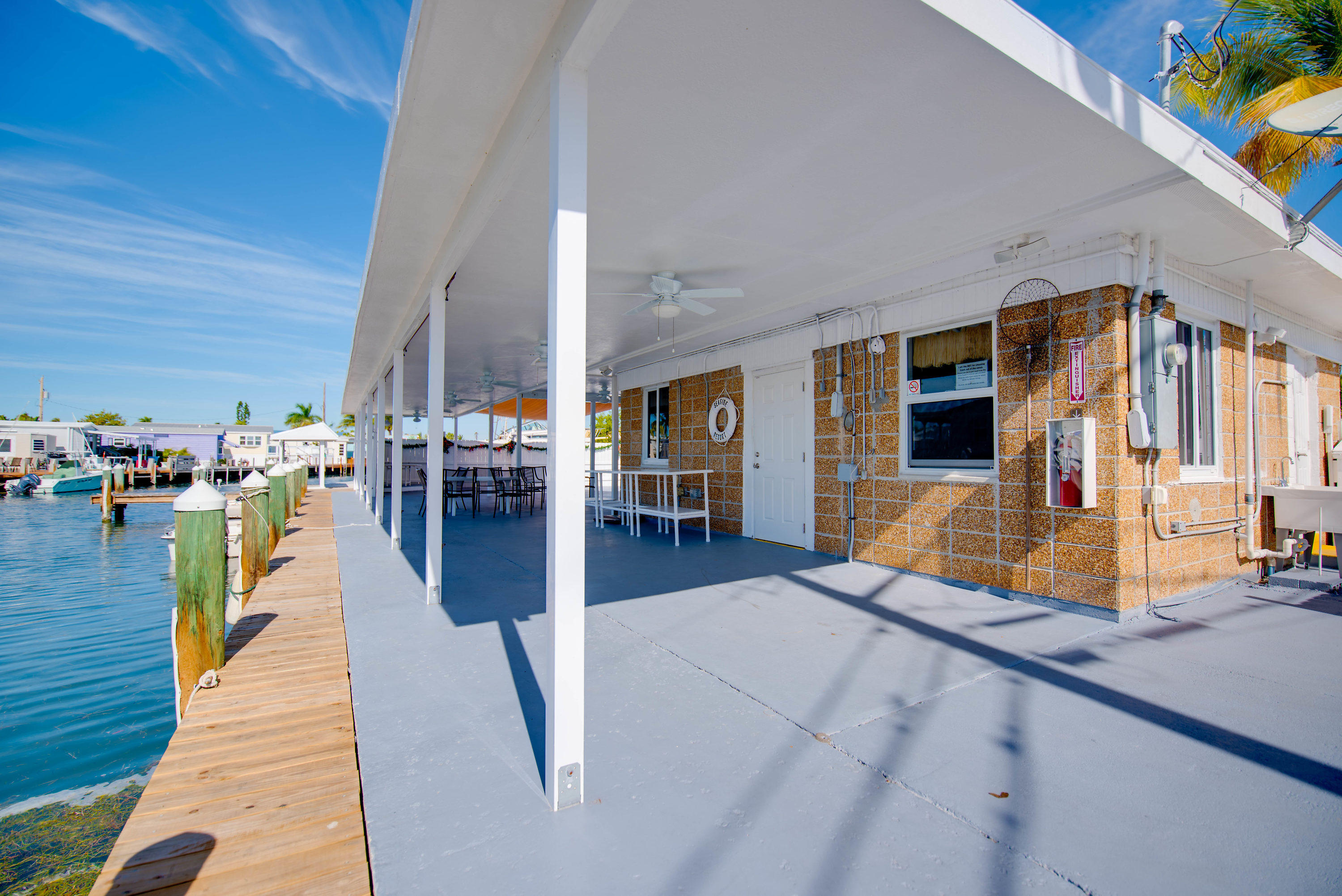 55 Boca Chica Road, Unit 430 Key West, FL 33040 - Photo 27 of 34 a swimming pool with outdoor seating