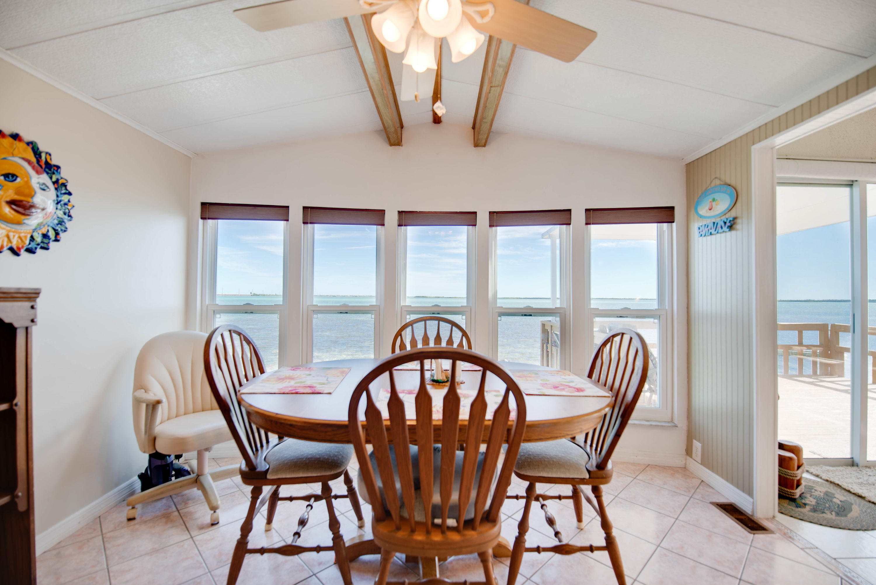 55 Boca Chica Road, Unit 430 Key West, FL 33040 - Photo 7 of 34 a view of a dining room with furniture window and outside view