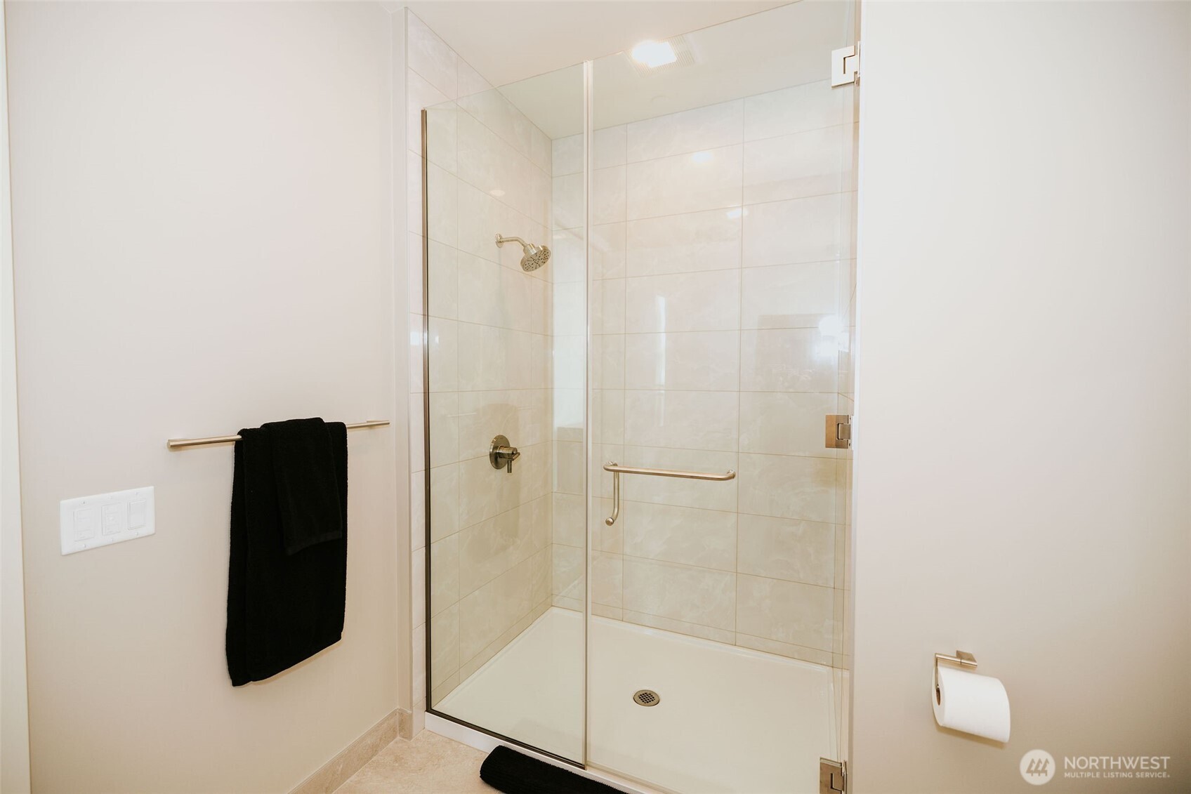 1340 4th Avenue, Unit 5803 Seattle, WA 98101 - Photo 22 of 39 a bathroom with a shower