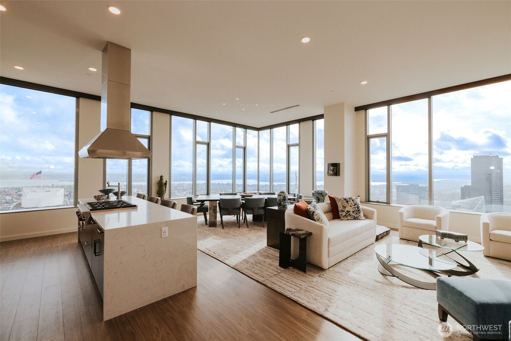 1340 4th Avenue, Unit 5803 Seattle, WA 98101 - Photo 32 of 39 a living room with furniture and large windows