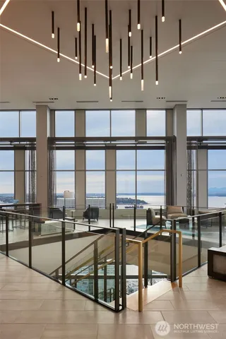 a view of living room with furniture and floor to ceiling window