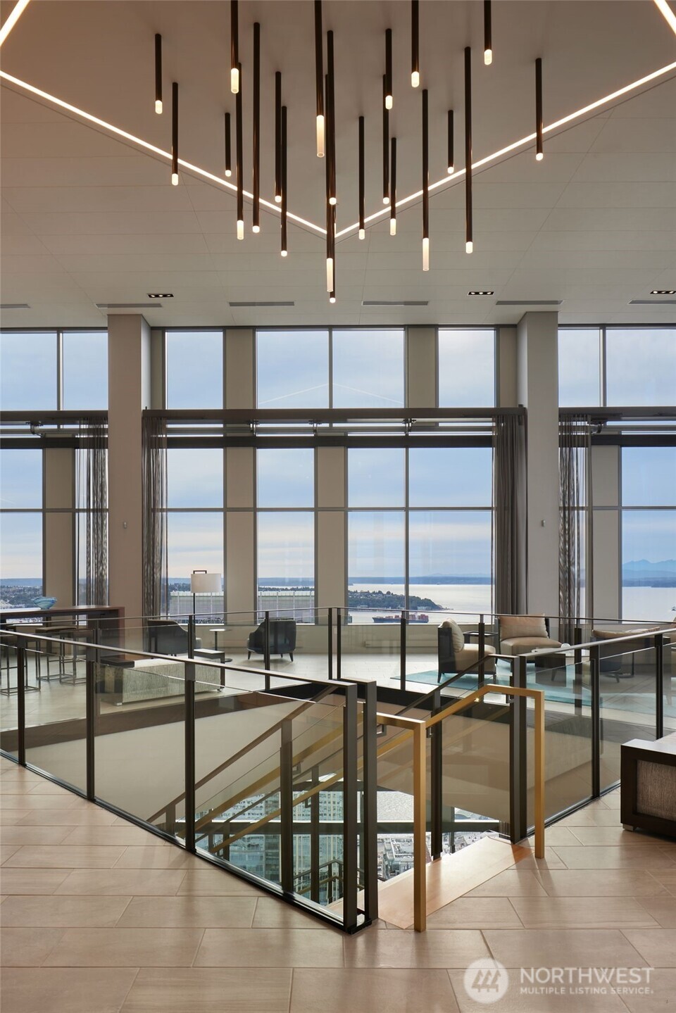 1340 4th Avenue, Unit 5803 Seattle, WA 98101 - Photo 34 of 39 a view of living room with furniture and floor to ceiling window