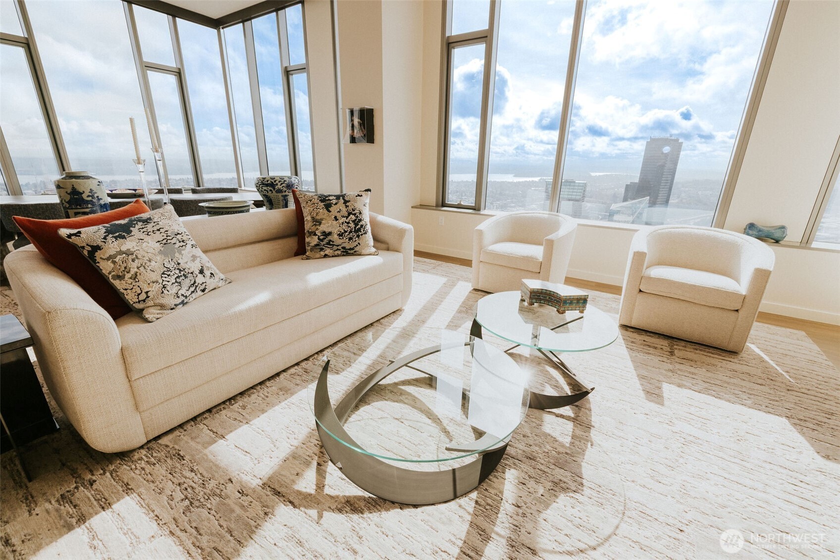 1340 4th Avenue, Unit 5803 Seattle, WA 98101 - Photo 6 of 39 a living room with furniture and a large window