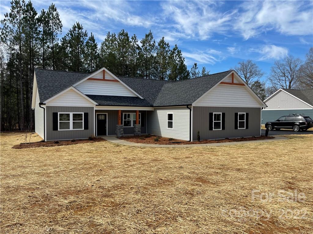 580 Crescent Road Salisbury, NC 28146 - Photo 2 of 38 a front view of a house with a garden