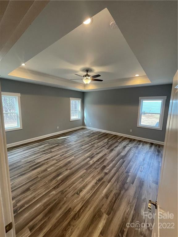 580 Crescent Road Salisbury, NC 28146 - Photo 28 of 38 wooden floor in an empty room with a window
