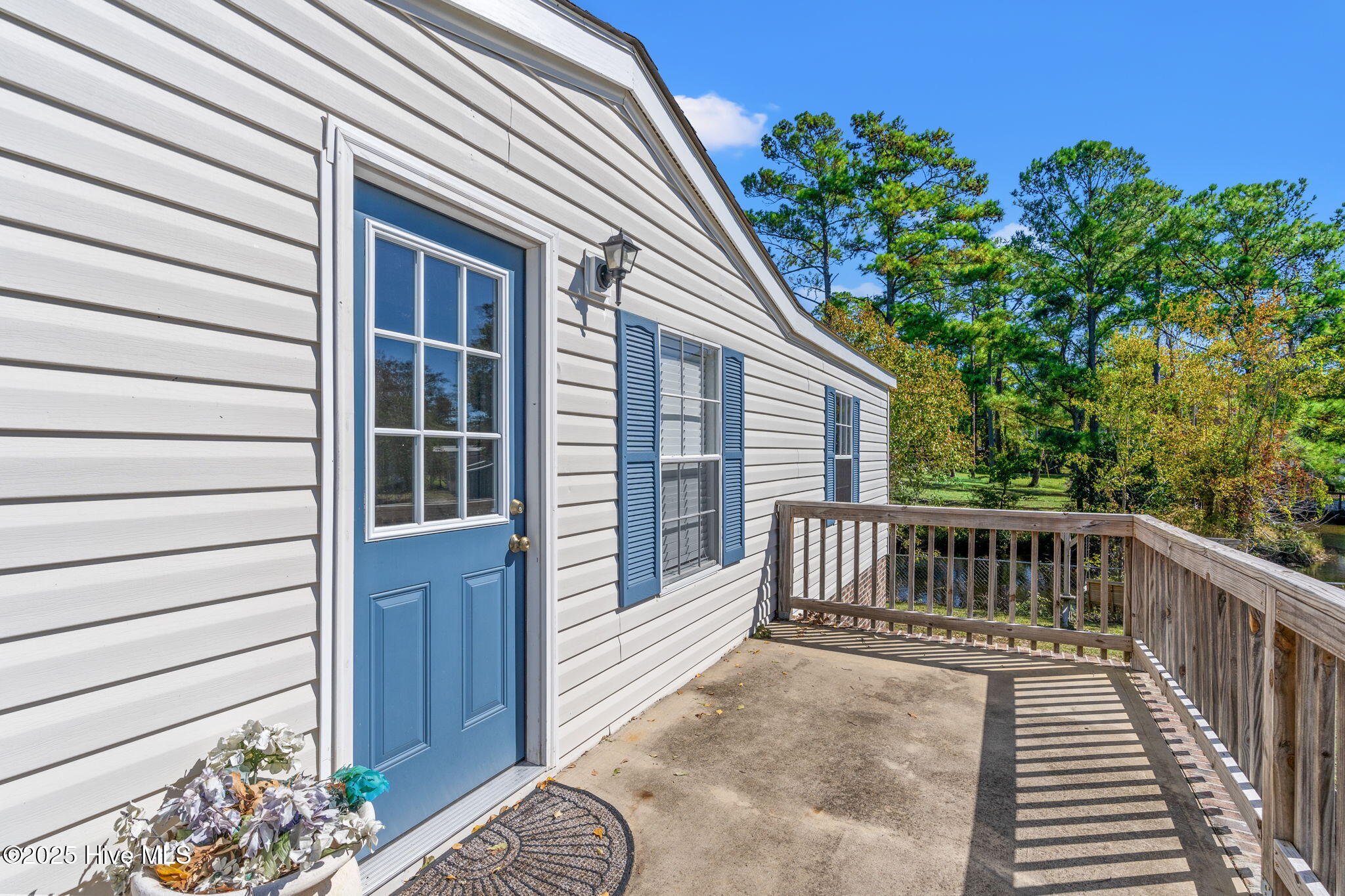 2807 Cross Bones Road Southwest Supply, NC 28462 - Photo 21 of 31 Front Porch with Pond View