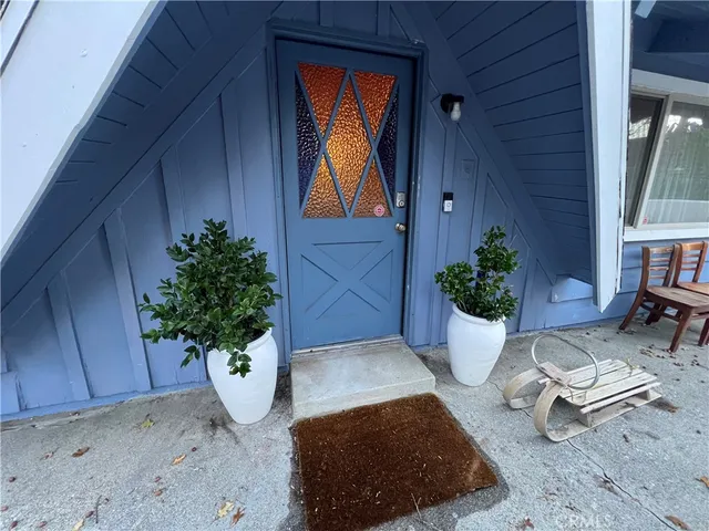 a view of a entryway in wooden house