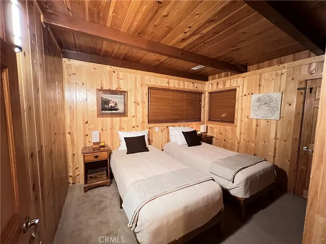 a bed room with a bed and a furniture