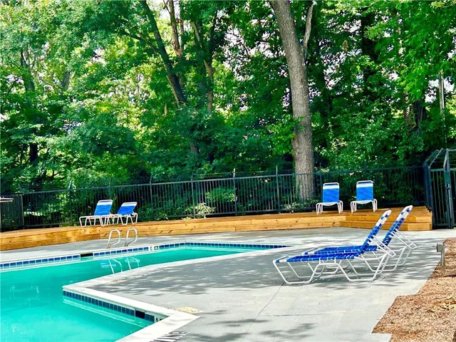 a view of a sign board with yard