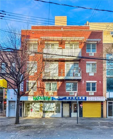 a view of a building with a street