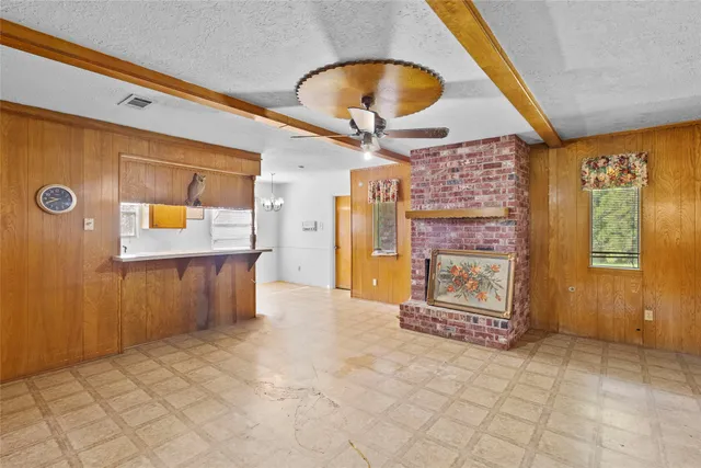 a view of a hallway with front door