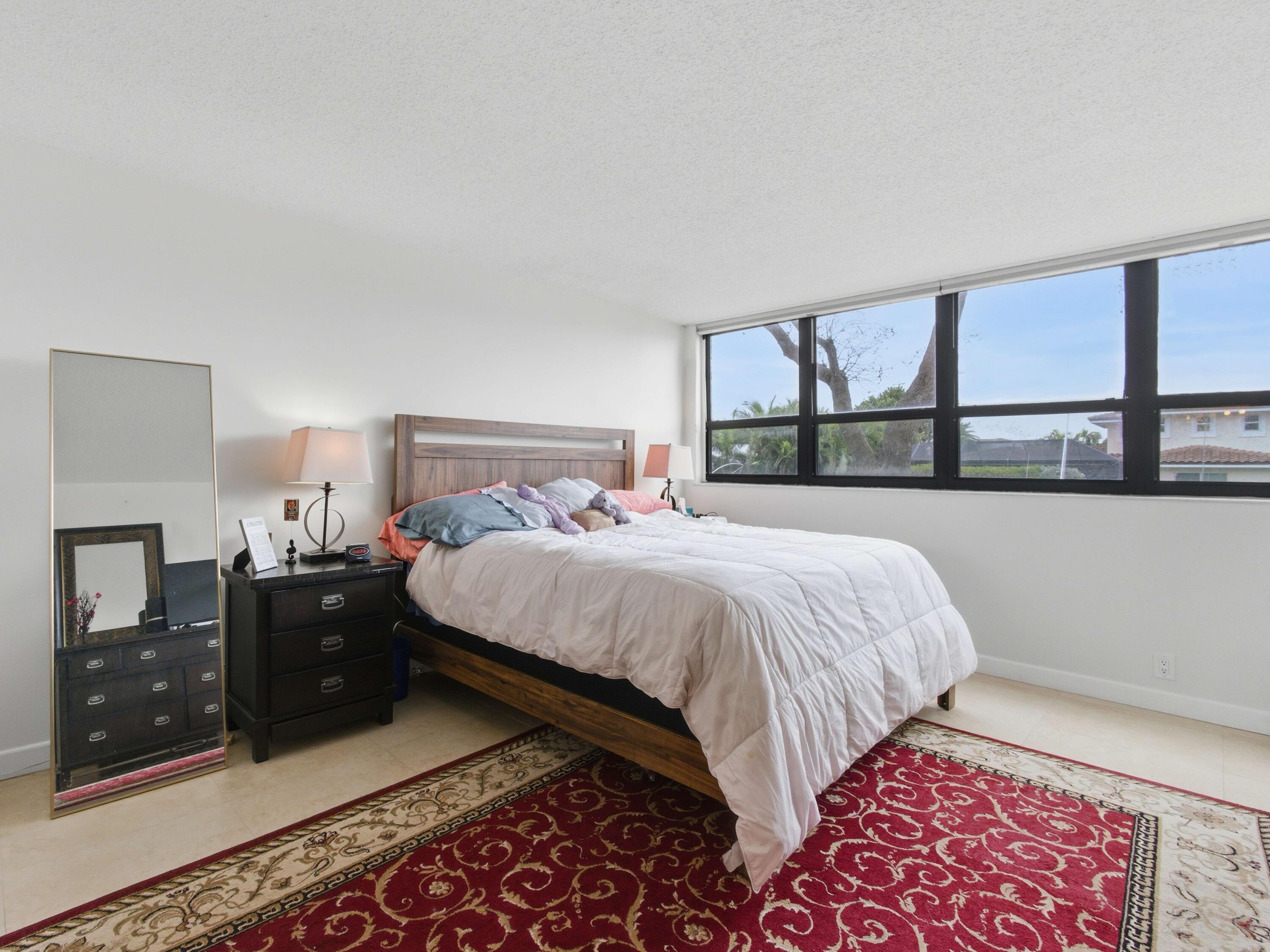 800 Jeffery Street, Unit 102 Boca Raton, FL 33487 - Photo 14 of 24 Primary Bedroom