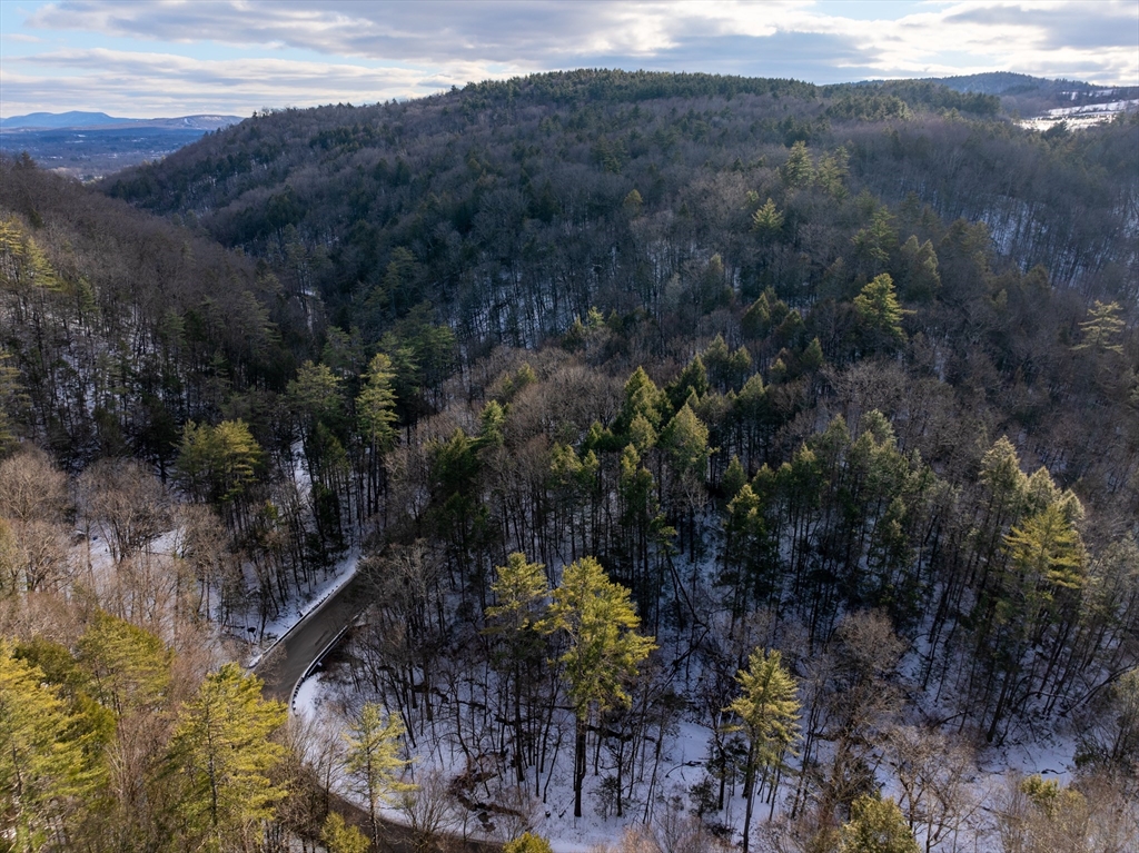 0 Brook Road Shelburne Falls, MA 01370 - Photo 7 of 17 a view of a lake with a mountain