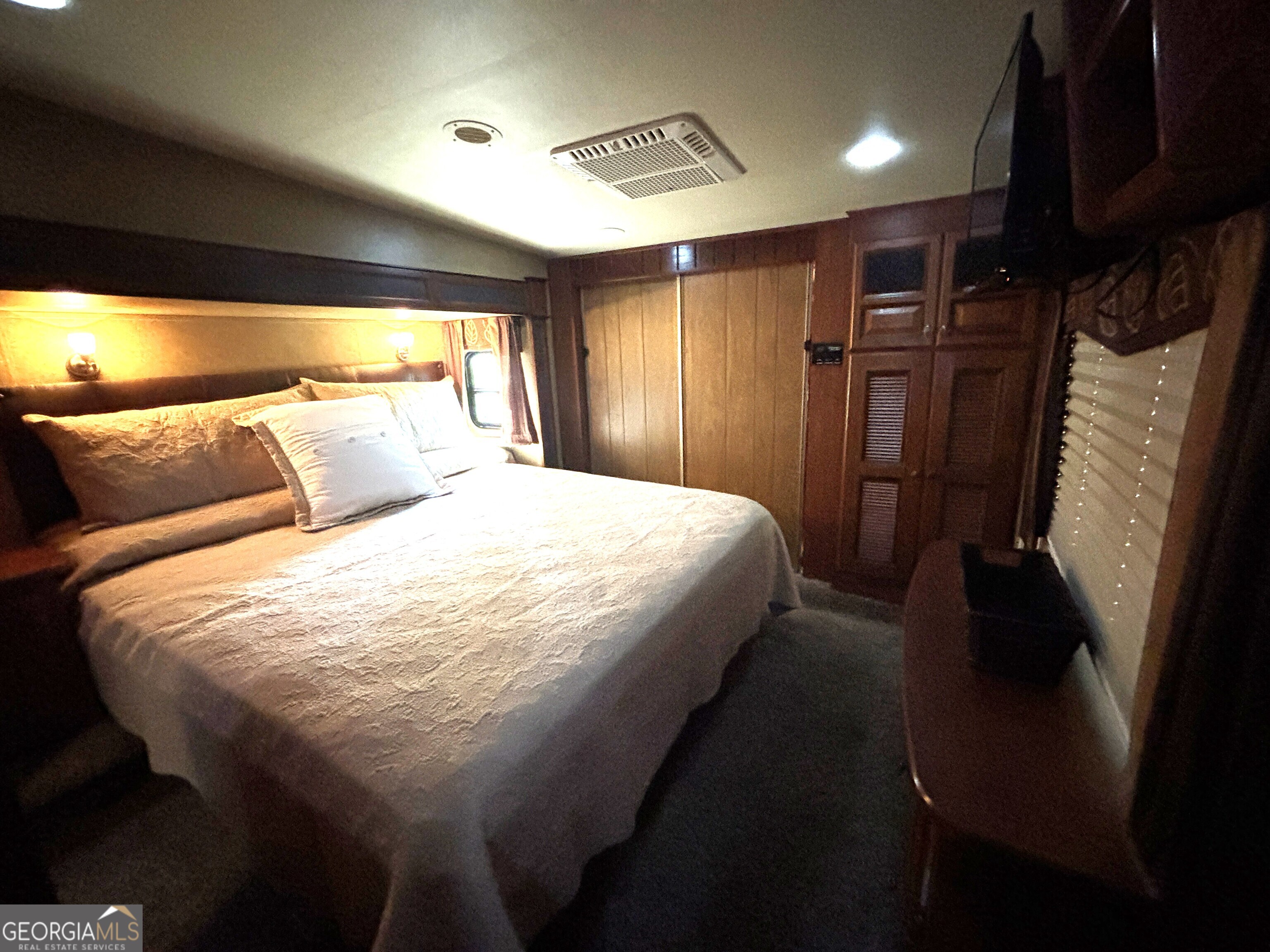 101 Bridge Loop Drive Cleveland, GA 30528 - Photo 36 of 93 a bed room with a bed and a refrigerator