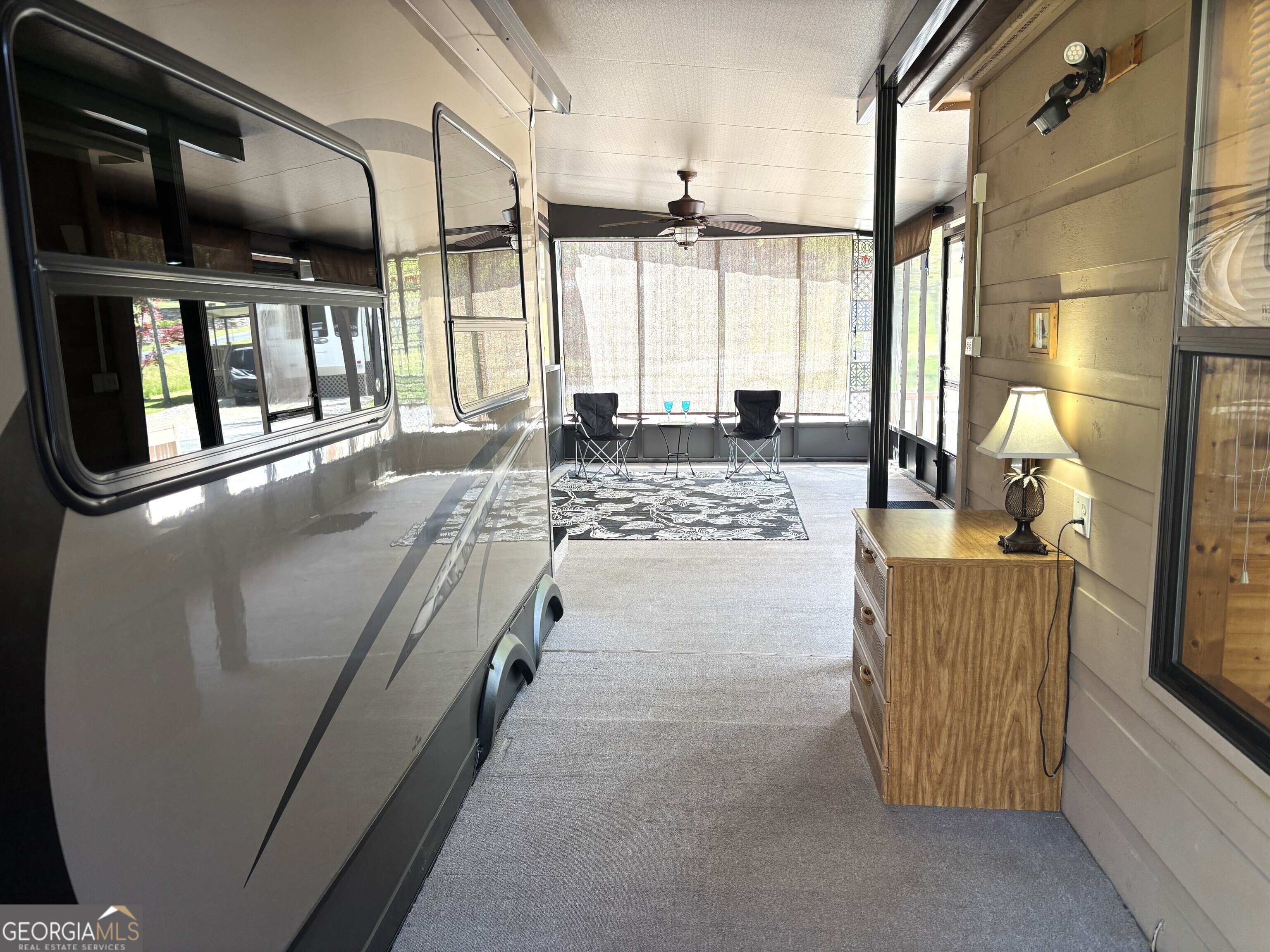 101 Bridge Loop Drive Cleveland, GA 30528 - Photo 47 of 93 a living room with furniture and a floor to ceiling window