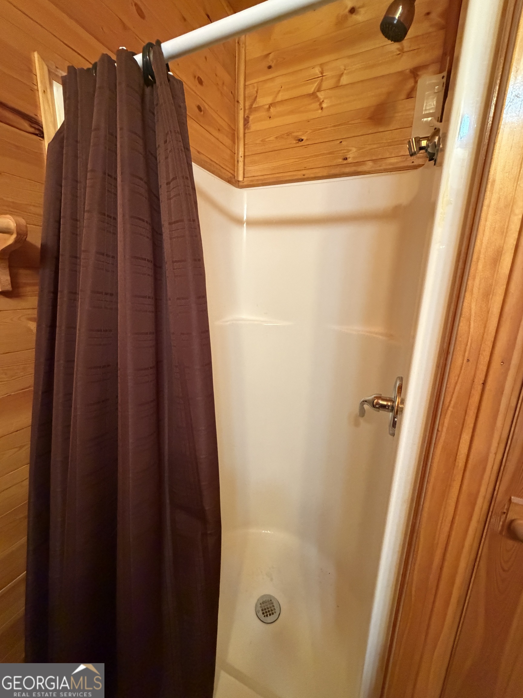 101 Bridge Loop Drive Cleveland, GA 30528 - Photo 60 of 93 a bathroom with a shower and a tub