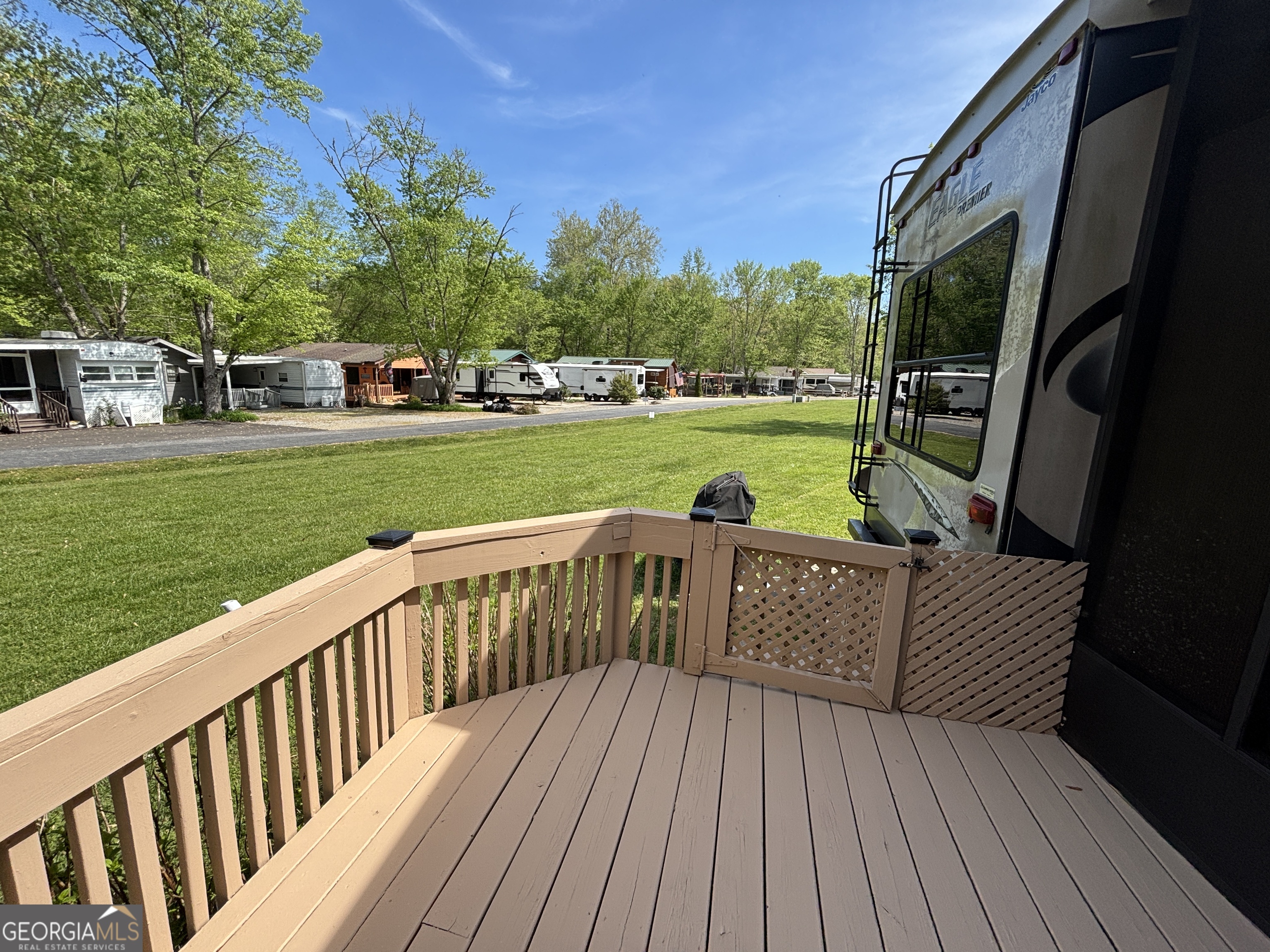 101 Bridge Loop Drive Cleveland, GA 30528 - Photo 70 of 93 a view of balcony with wooden floor and outdoor seating