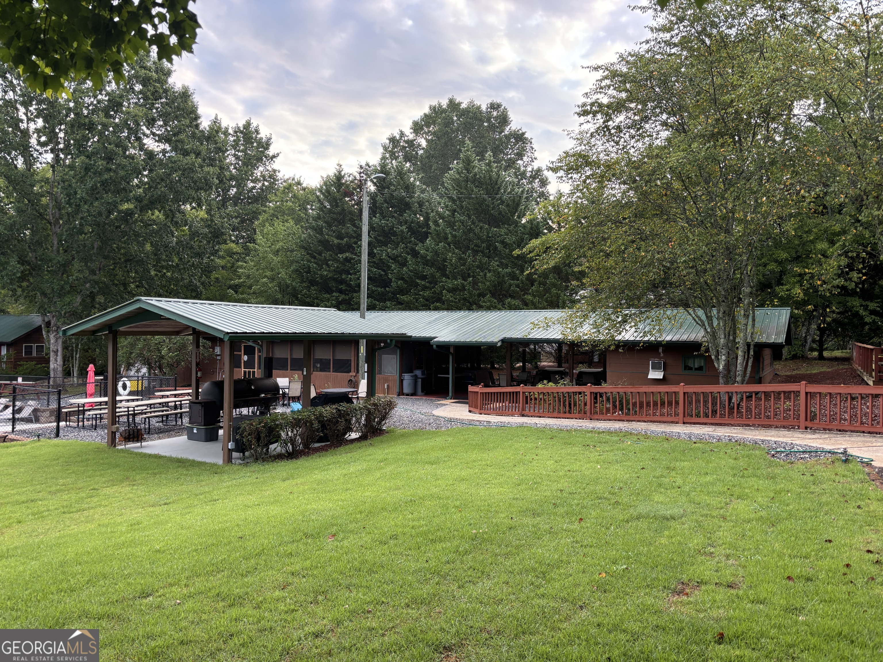 101 Bridge Loop Drive Cleveland, GA 30528 - Photo 74 of 93 a view of a house with a big yard and sitting area