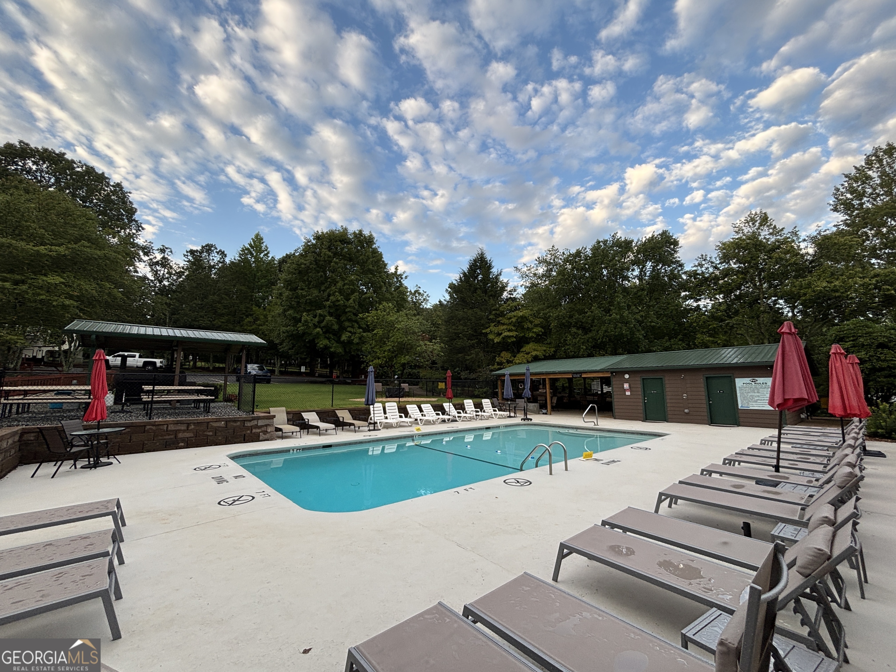 101 Bridge Loop Drive Cleveland, GA 30528 - Photo 78 of 93 a view of a house with swimming pool and sitting area