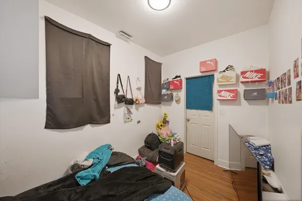 a room with furniture and wooden floor