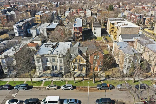 an aerial view of a city with lots of residential buildings