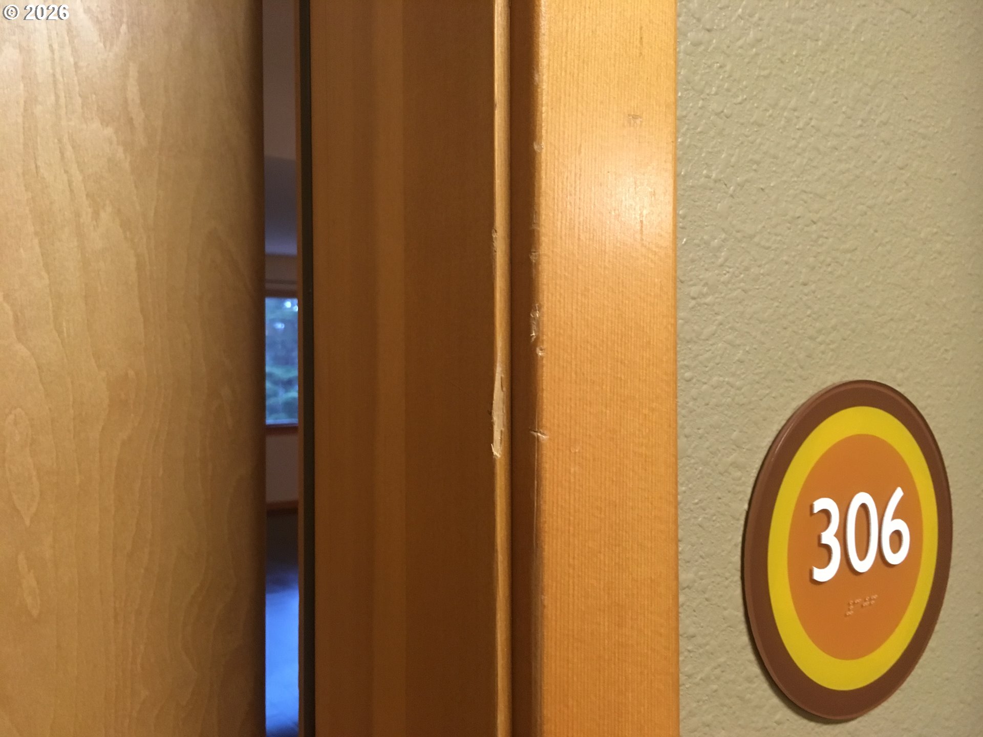 7910 Southwest 31st Avenue, Unit 306 Portland, OR 97219 - Photo 2 of 19 a view of a bathroom with a sink and a mirror
