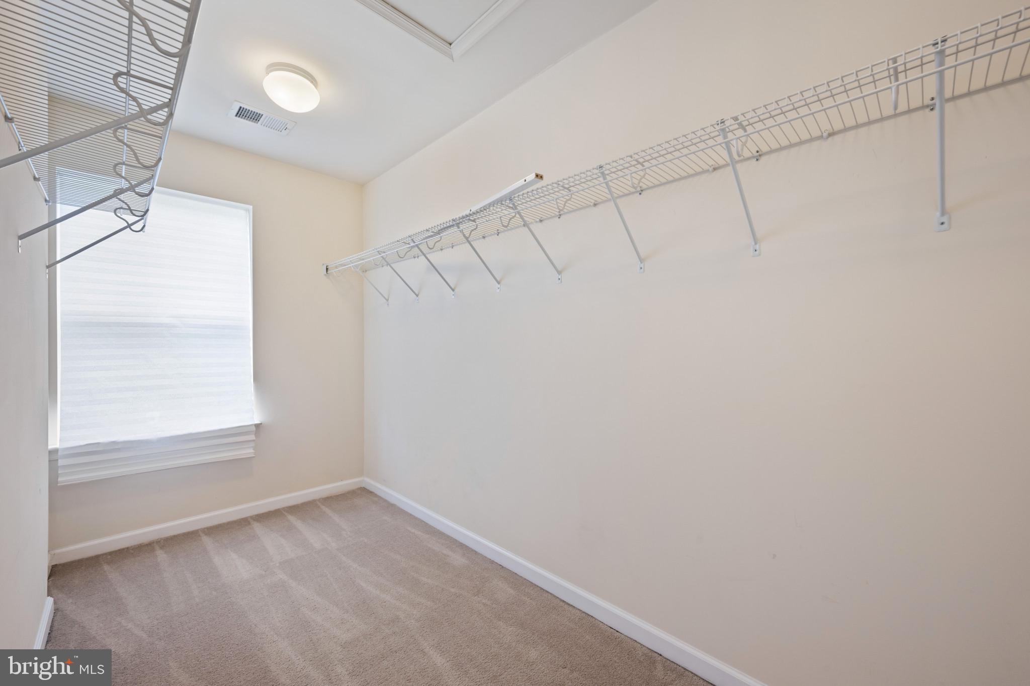7062 Foxton Way Hanover, MD 21076 - Photo 27 of 41 a view of a room with racks on the wall