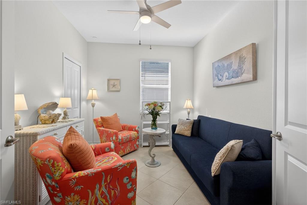 2323 Dragonfruit Way Naples, FL 34120 - Photo 17 of 32 a living room with furniture and a couch