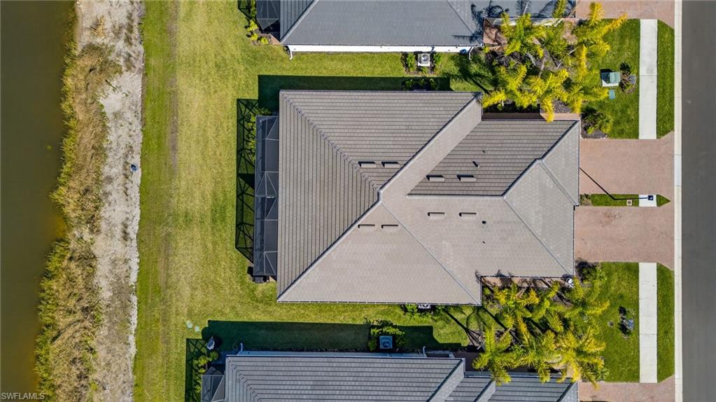 2323 Dragonfruit Way Naples, FL 34120 - Photo 28 of 32 a picture of a yard