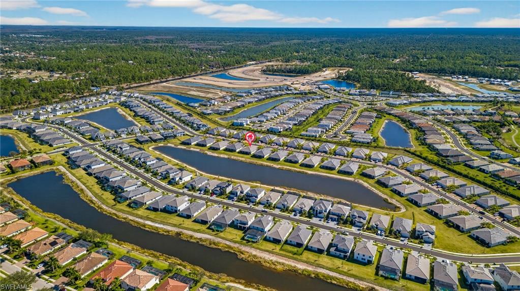2323 Dragonfruit Way Naples, FL 34120 - Photo 32 of 32 an aerial view of residential building and ocean