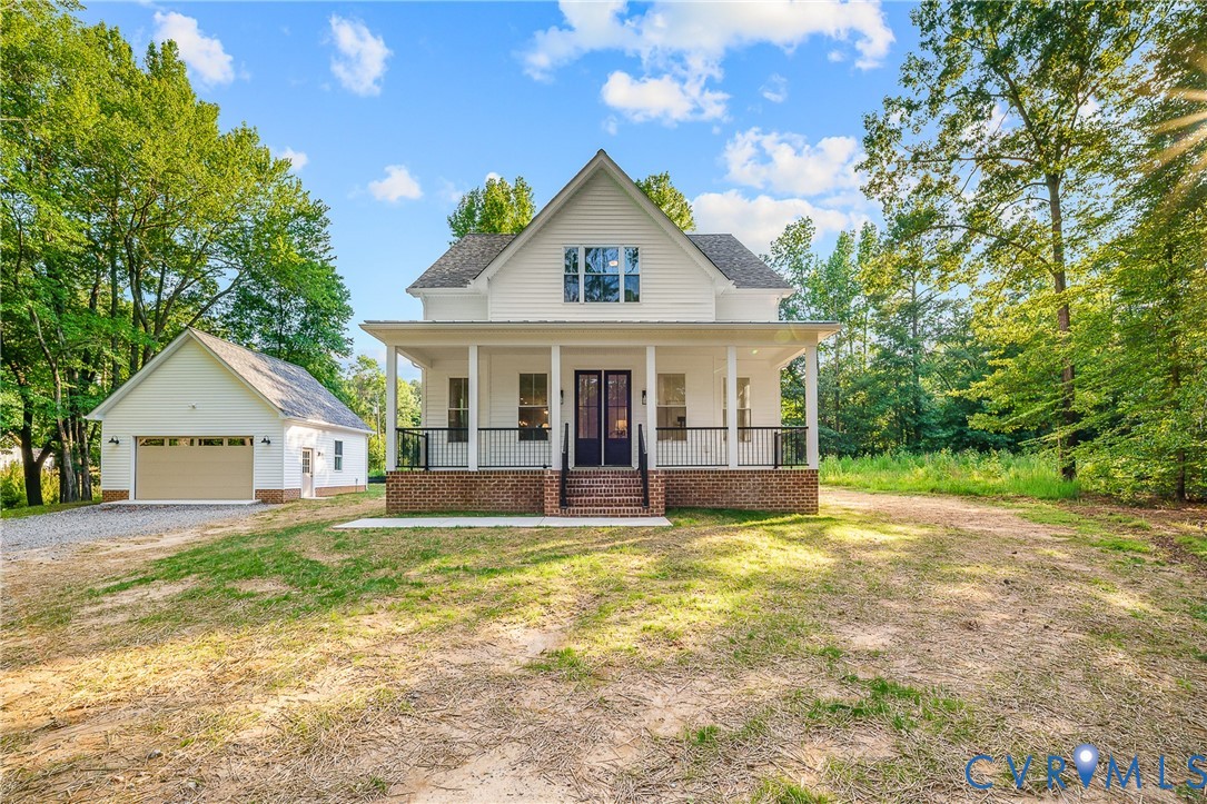 8299 Pamlico Road Ashland, VA 23005 - Photo 33 of 35 a view of a house with a big yard and large trees