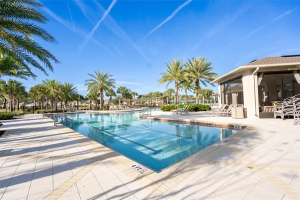 a view of a house with swimming pool