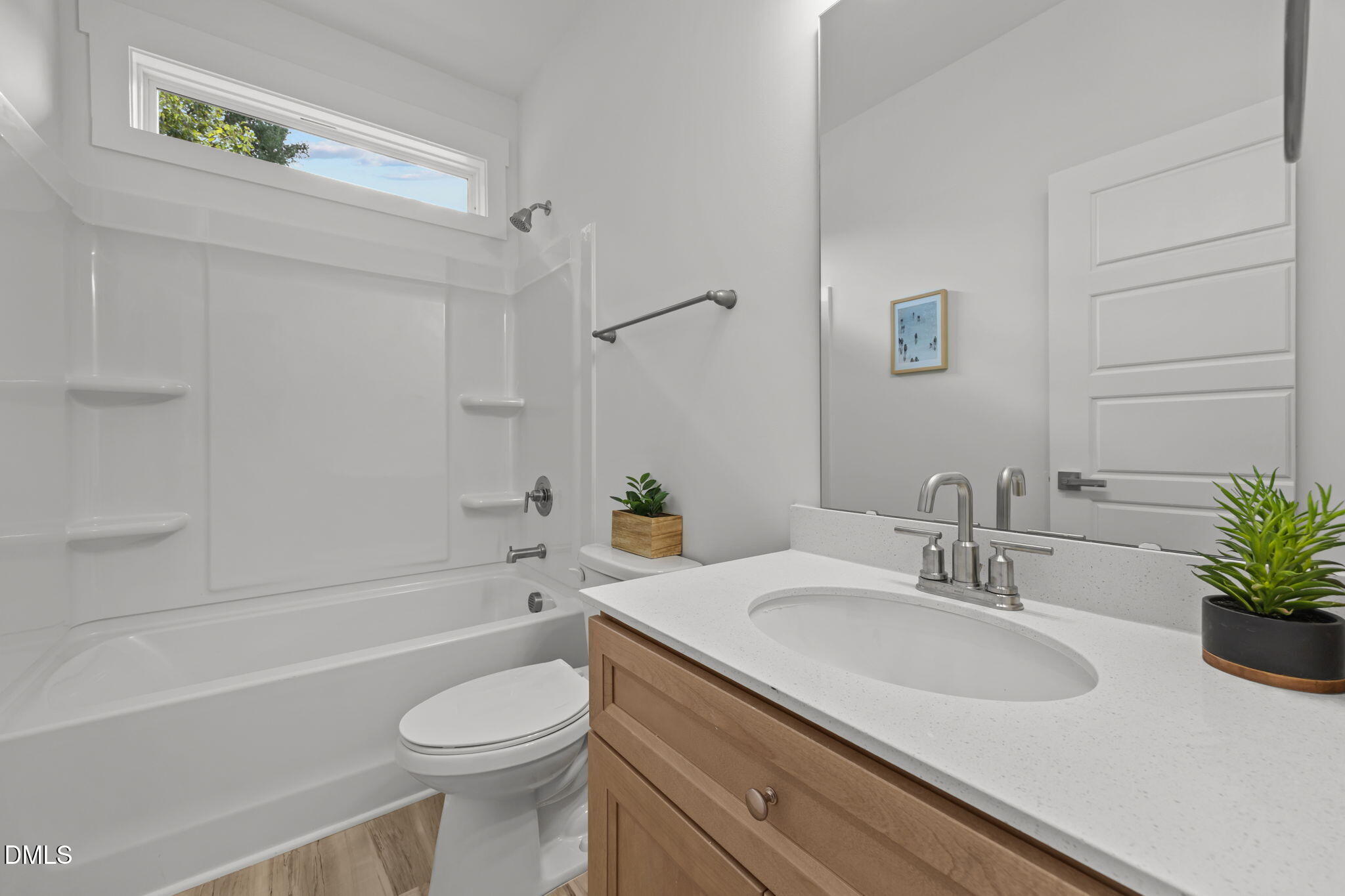 144 Howard Harris Road Franklinton, NC 27525 - Photo 14 of 21 a bathroom with a sink a toilet and a bathtub