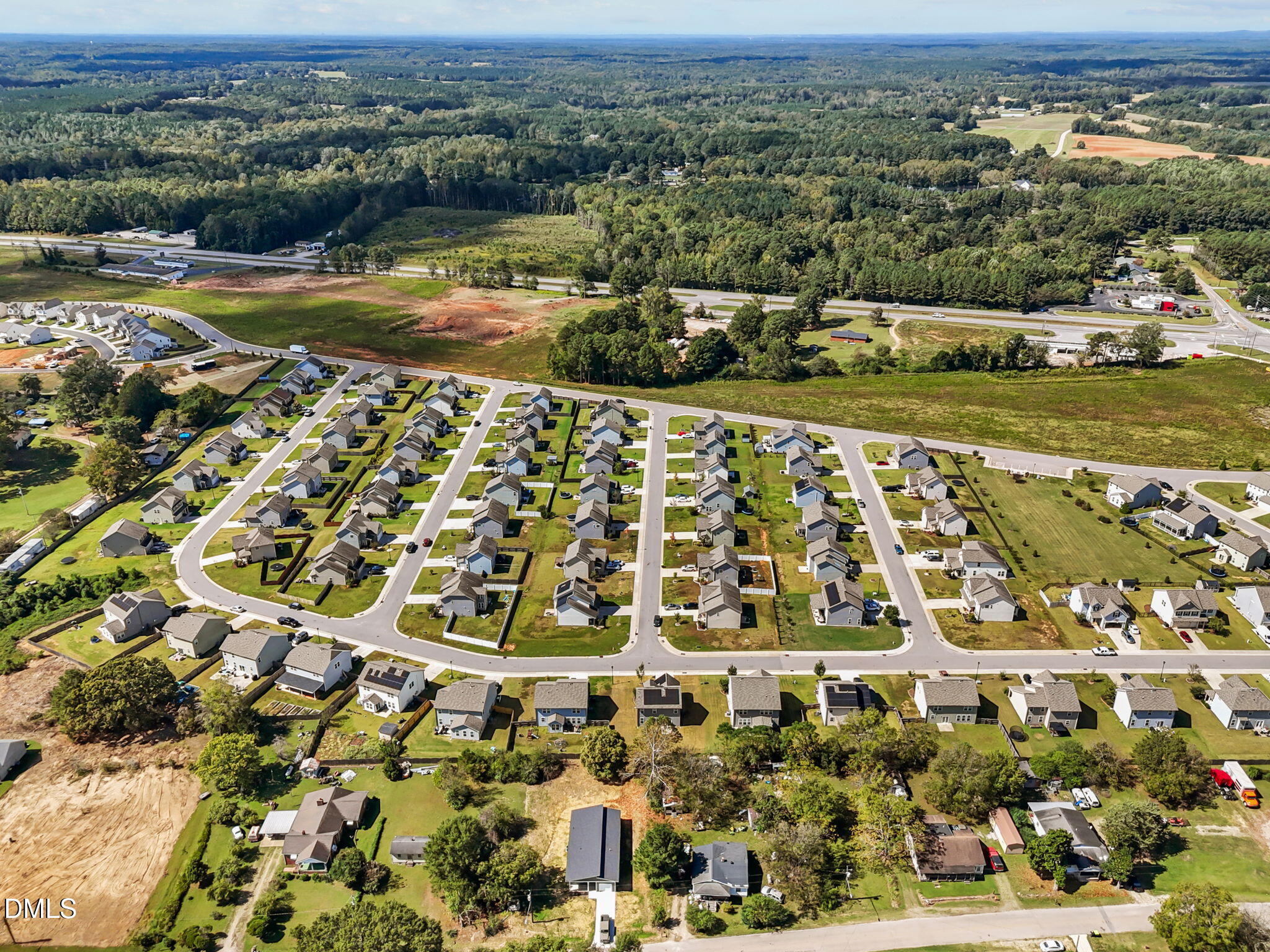 144 Howard Harris Road Franklinton, NC 27525 - Photo 21 of 21 an aerial view of a house with a lake view
