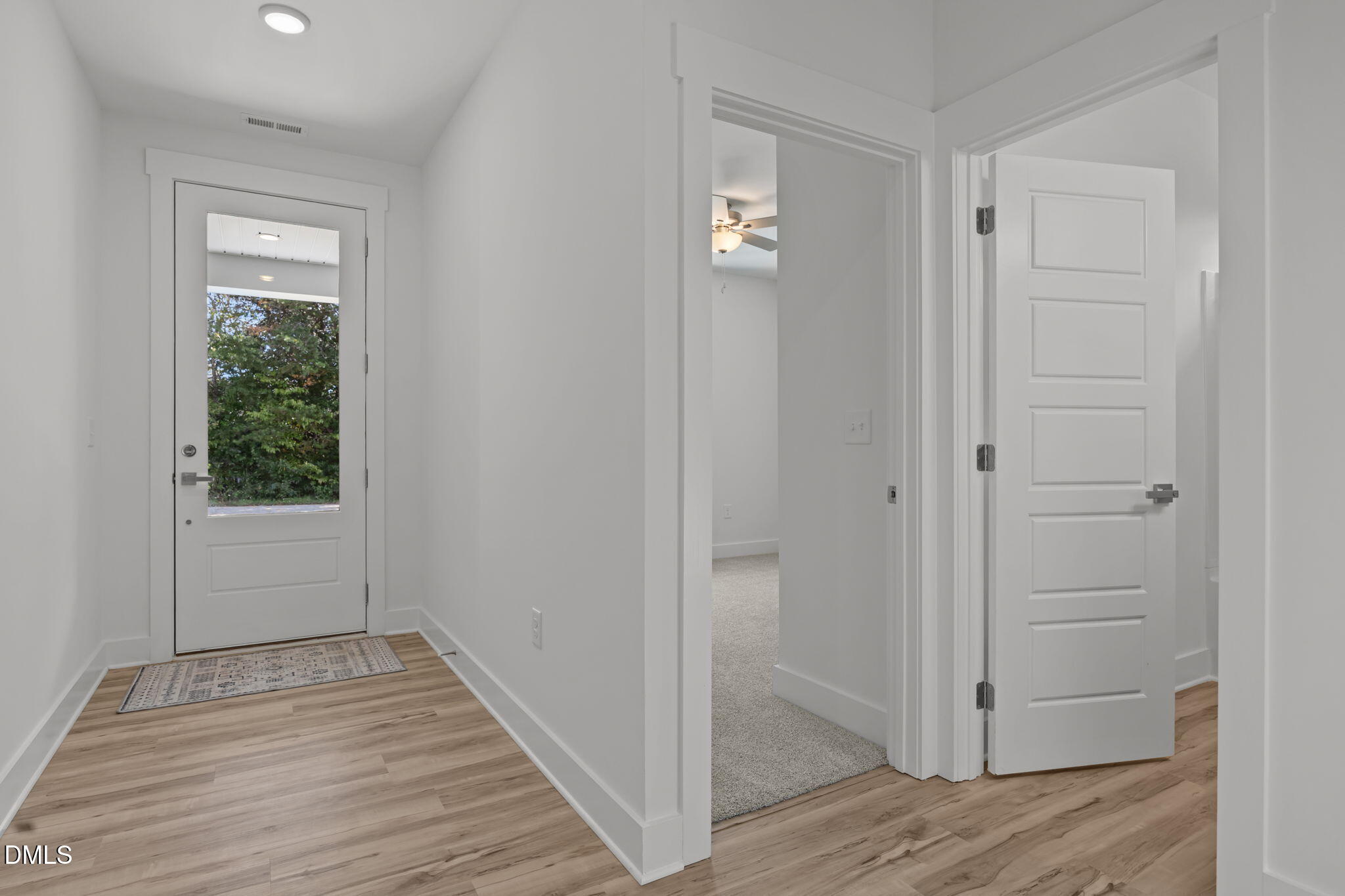 144 Howard Harris Road Franklinton, NC 27525 - Photo 5 of 21 a view of a hallway with wooden floor