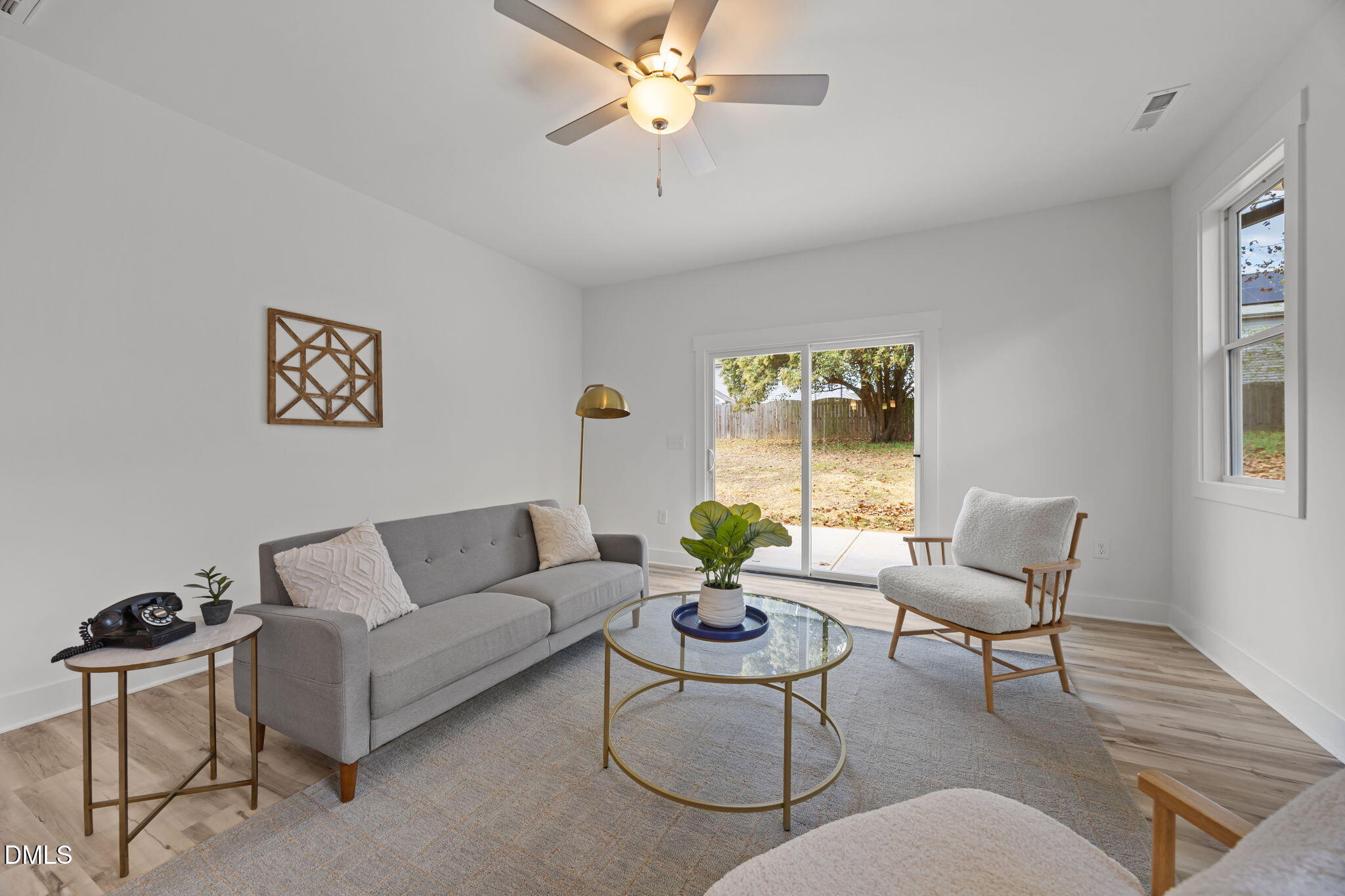 144 Howard Harris Road Franklinton, NC 27525 - Photo 7 of 21 a living room with furniture and a window