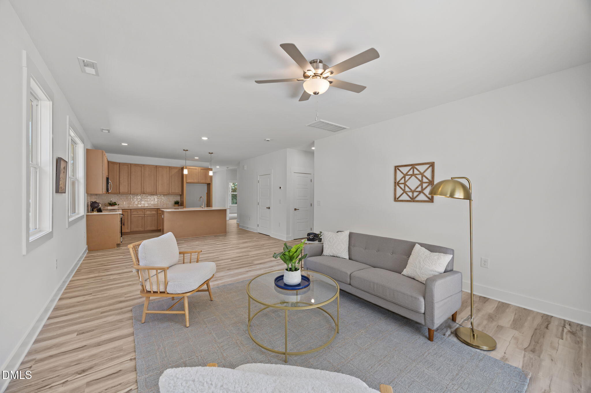 144 Howard Harris Road Franklinton, NC 27525 - Photo 8 of 21 a living room with furniture and kitchen view